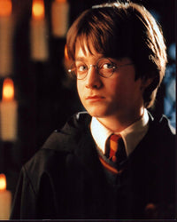 Daniel Radcliffe in costume as Harry Potter on set photo print