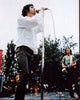 Jim Morrison live performance photo print showcasing the iconic rock star on stage.