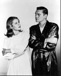 Black and white photo print of Elizabeth Montgomery and Dick York in pajamas from Bewitched.