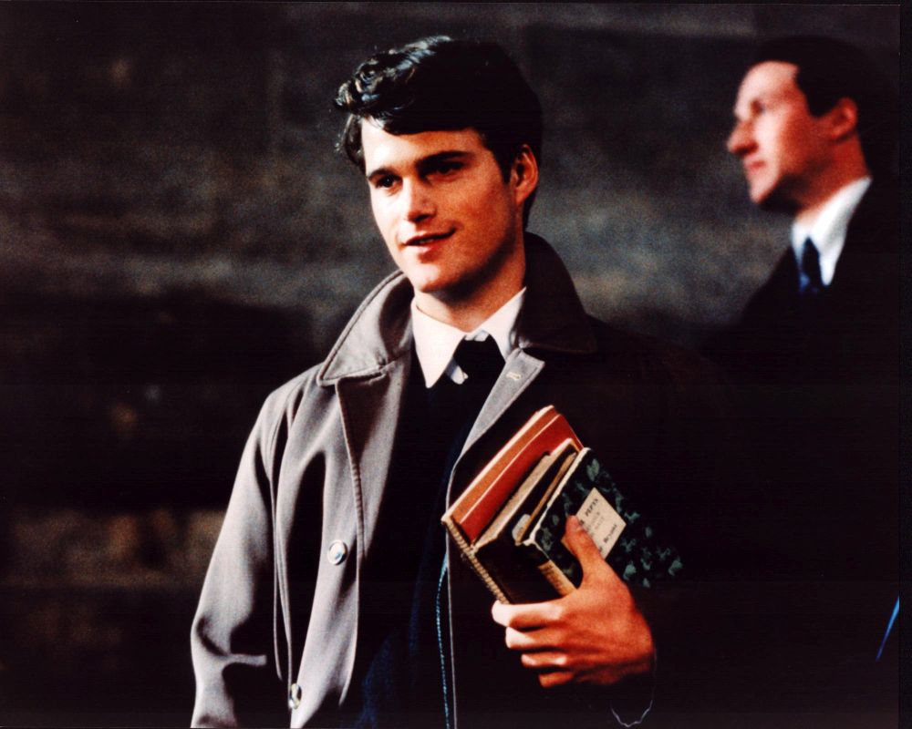 Chris O'Donnell Holding Books in Circle of Friends Photo Print