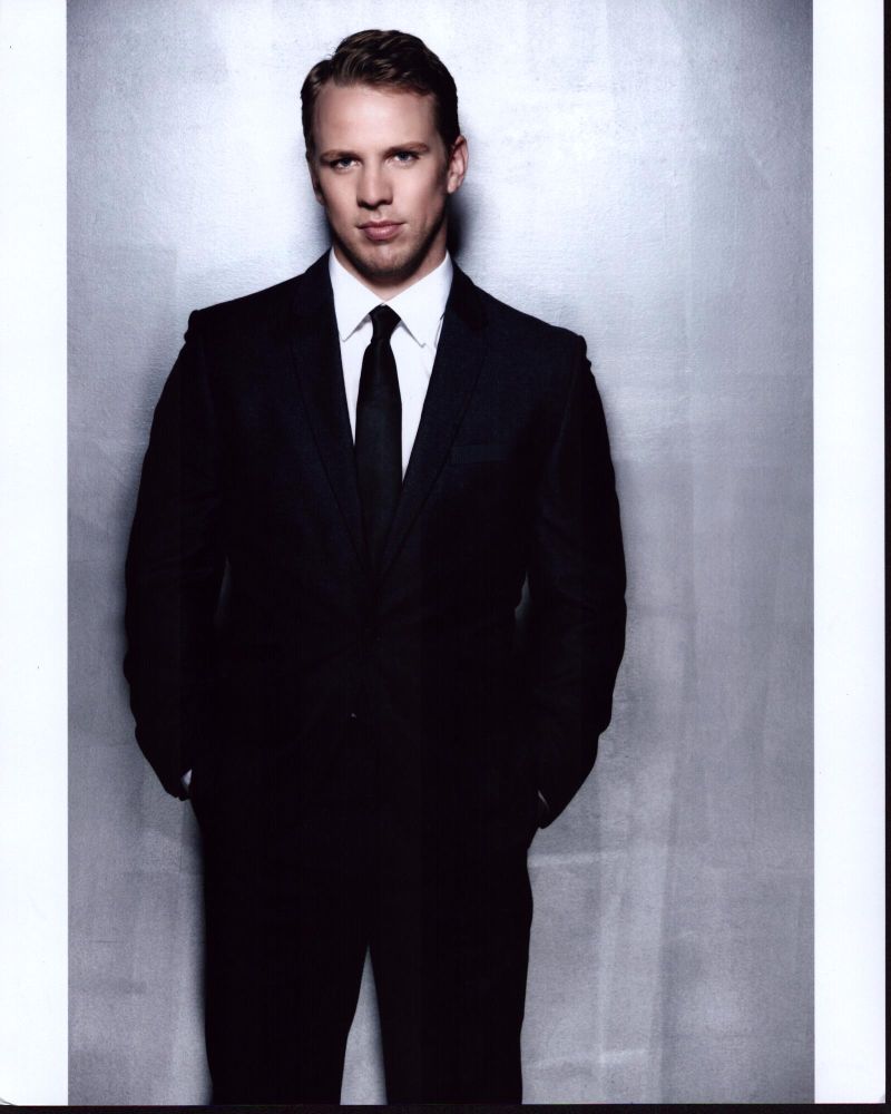John Gammon in Black Suit and Tie Photo Print