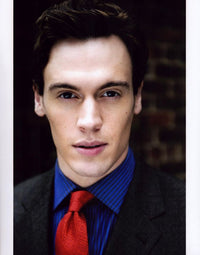 Erich Bergen photo print in blue striped shirt and red tie, stylish decor.