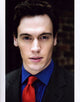 Erich Bergen photo print in blue striped shirt and red tie, stylish decor.