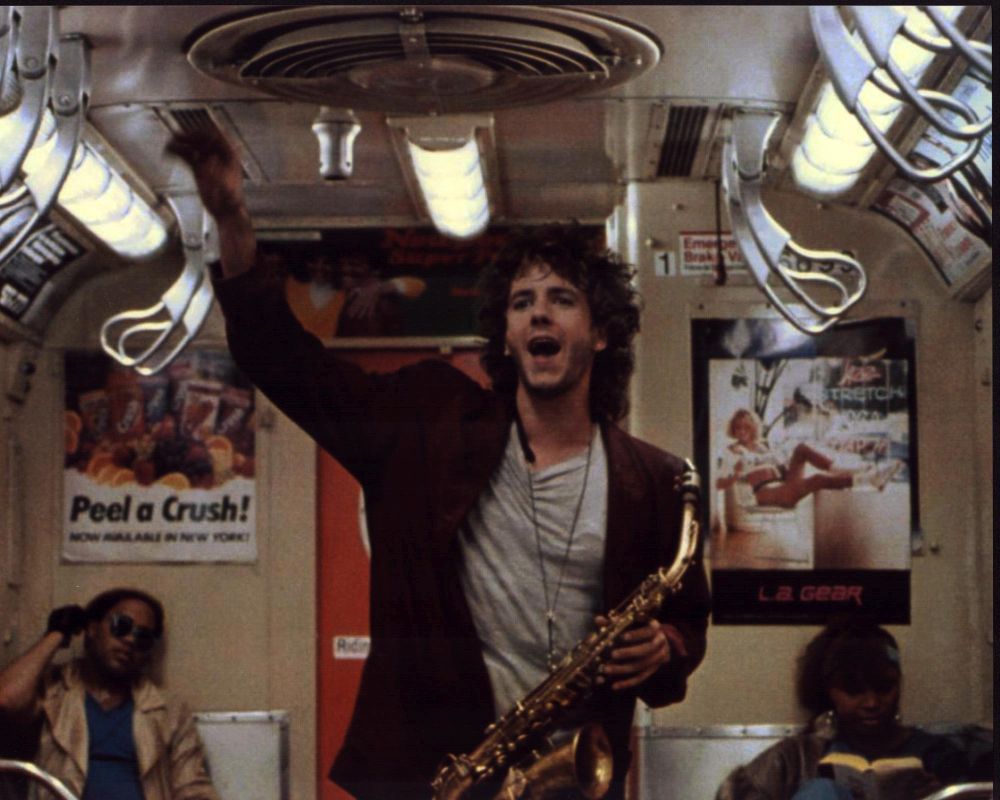 Scott Valentine playing saxophone on subway - Photo Print