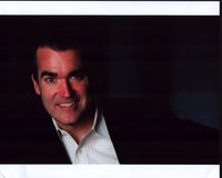 Brian D'Arcy James smiling in checkered shirt and blazer photo print