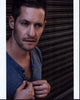 Jeremy Glazer unbuttoning gray shirt photo print
