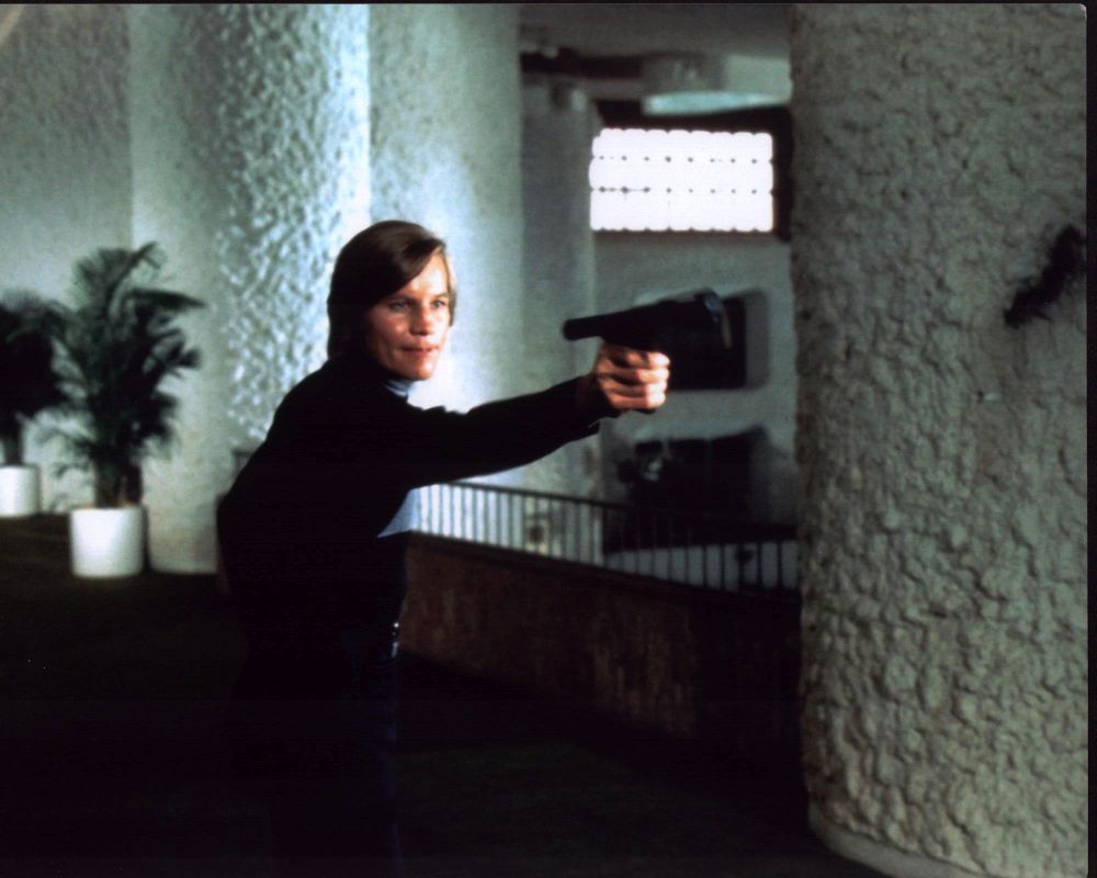 Michael York shooting a gun in Logan's Run photo print