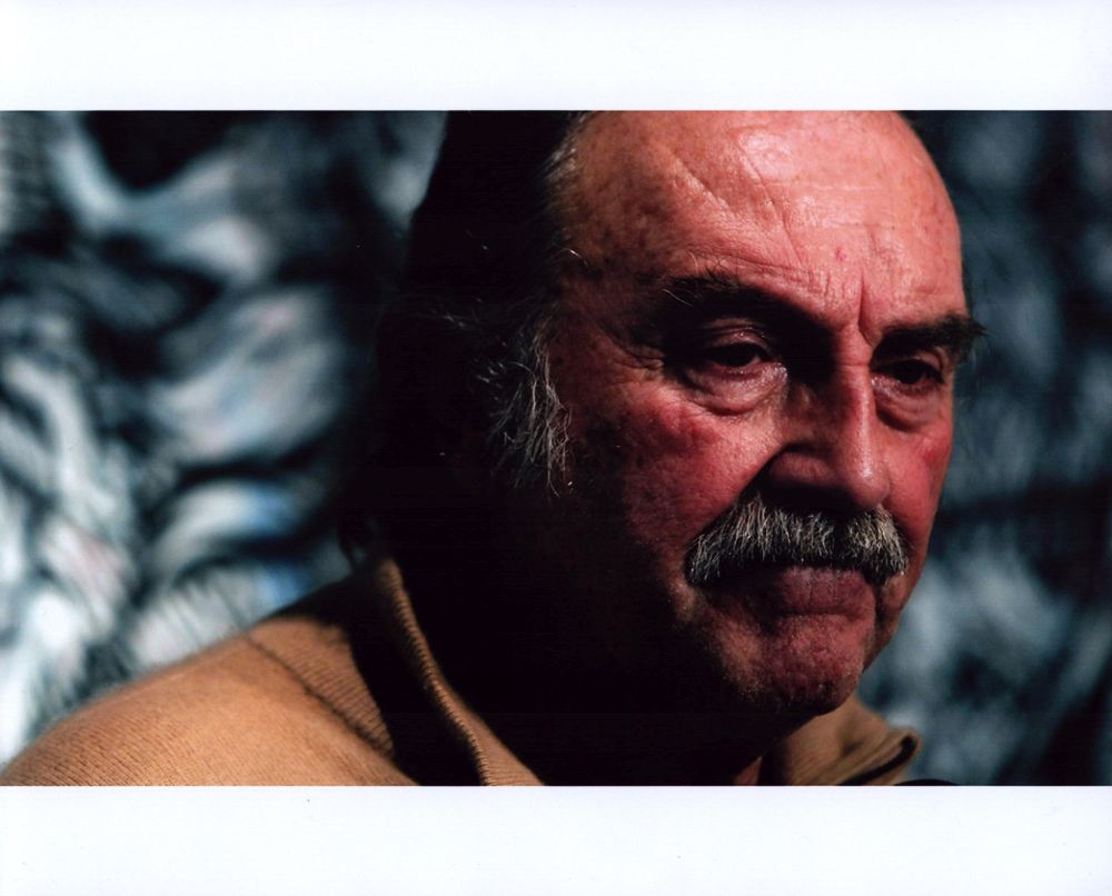 Close-up photo print of Pedro Armendáriz Jr. in brown sweater