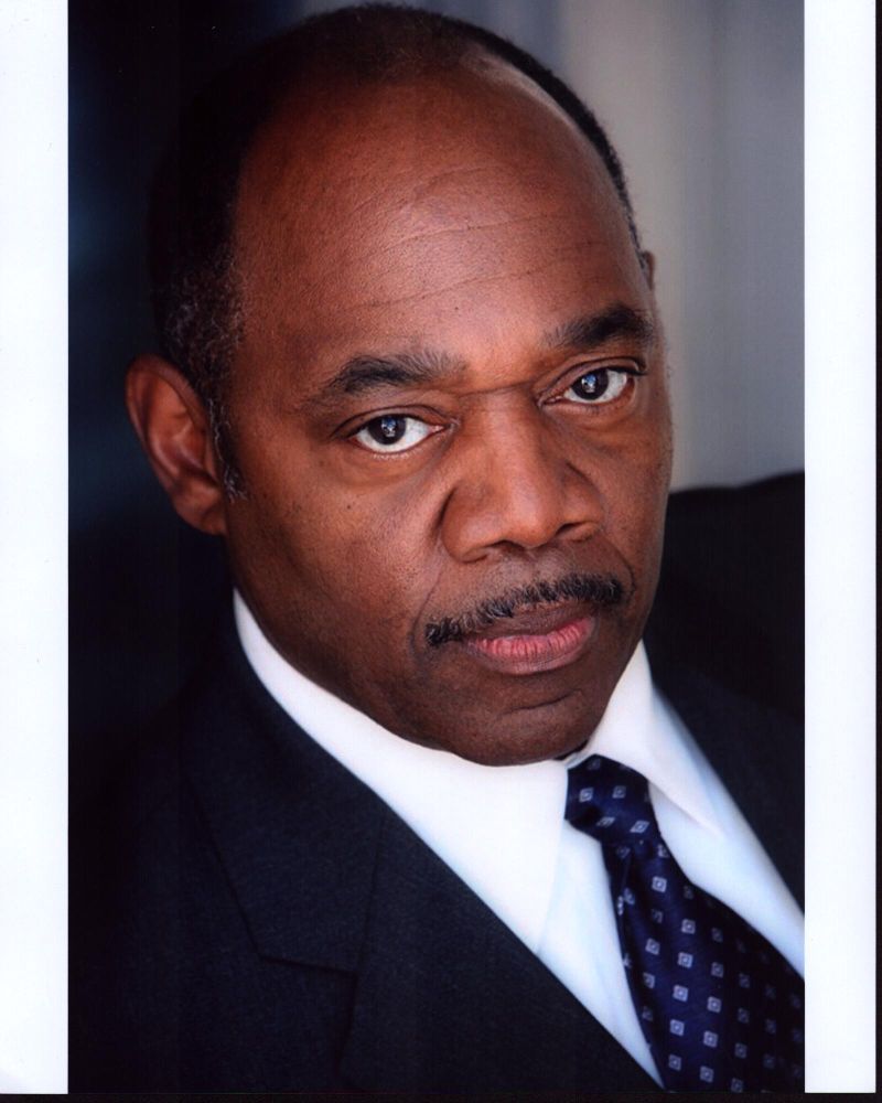 Gregg Daniel in Suit with Navy Tie Photo Print