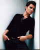 Ed Westwick leaning against a wall in a black top photo print