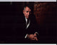 Sean Pertwee leaning forward in unbuttoned shirt photo print