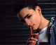 RJ Word with Finger by Mouth Photo Print, expressive art piece.