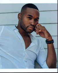Tye White photo print - Sitting with arm up in unbuttoned shirt