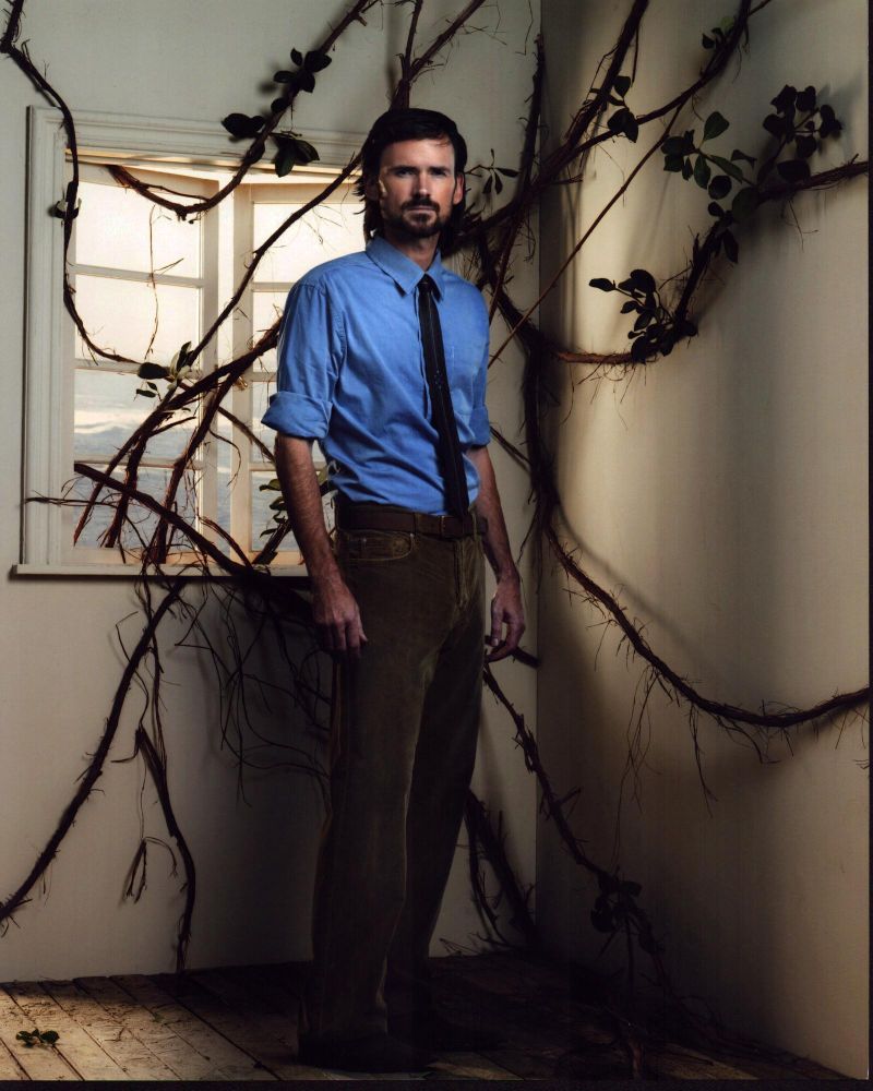 Jeremy Davies In Corner With Vines Photo Print showcasing vibrant greenery.