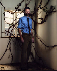 Jeremy Davies In Corner With Vines Photo Print showcasing vibrant greenery.