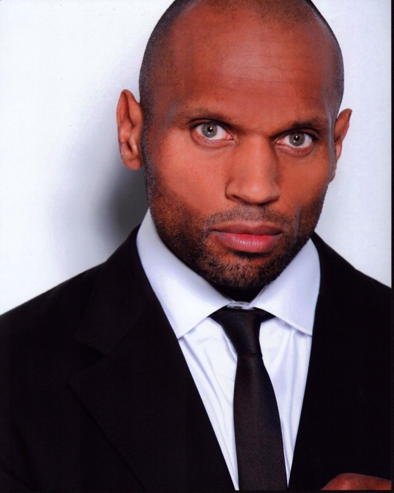 Mark Rhino Smith headshot in black suit photo print