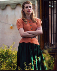 Emma Roberts in Orange Sweater with Arms Crossed Photo Print