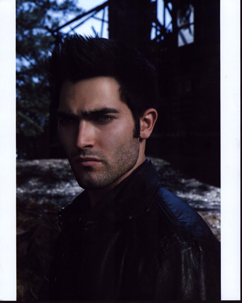Photo print of Tyler Hoechlin in a black leather jacket, showcasing his style.