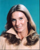 Cloris Leachman headshot photo print featuring a high tan collar.