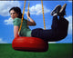 Sarah Silverman on red tire swing photo print