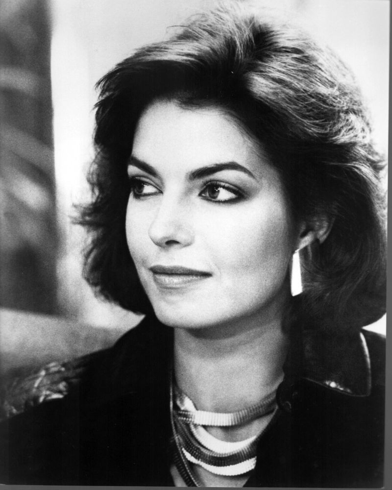 Sela Ward black and white photo print featuring bulky earrings and necklace