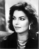 Sela Ward black and white photo print featuring bulky earrings and necklace