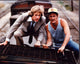 Terry Moore and Gerald McRaney on top of a train in Simon & Simon photo print.
