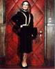 Lizabeth Scott posing in front of a padded red door - classic Hollywood photo print.