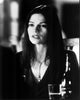 Black and white photo print of Jill Hennessy sitting at a table.