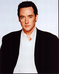 John Cusack photo print in white shirt and black blazer, capturing Hollywood style.