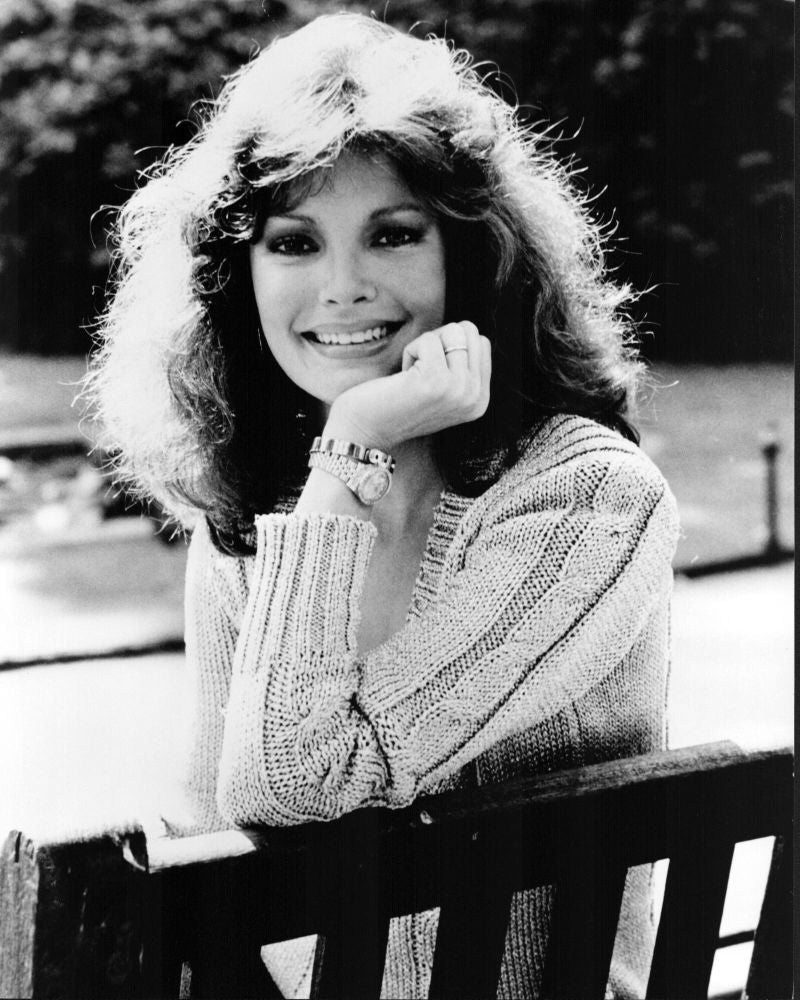 Jacqueline Smith black and white photo print leaning on elbow.