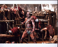 Peter Mensah Fighting in Spartacus Photo Print showcasing an intense battle scene.