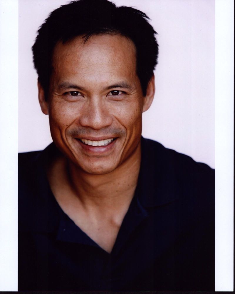 Ray Chang headshot photo print in navy blue shirt