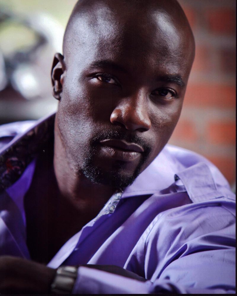 Mike Colter headshot in purple unbuttoned shirt photo print