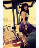Misty Rosas on train platform with teddy bear photo print