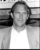 Kevin Costner black and white photo print in shirt and blazer.