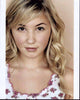 Audrey Whitby headshot photo print featuring her in a white and pink top.
