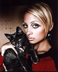 Nicole Richie holding a kitten photo print.