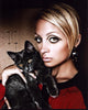 Nicole Richie holding a kitten photo print.