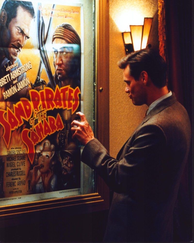 Jim Carrey Looking At The Majestic Movie Poster - Photo Print