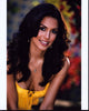 Raquel Pomplun headshot photo print in yellow top.