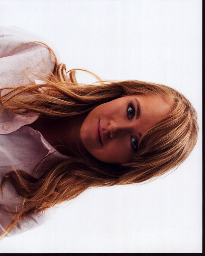 Amber Marshall headshot photo print in pink button down shirt