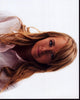 Amber Marshall headshot photo print in pink button down shirt