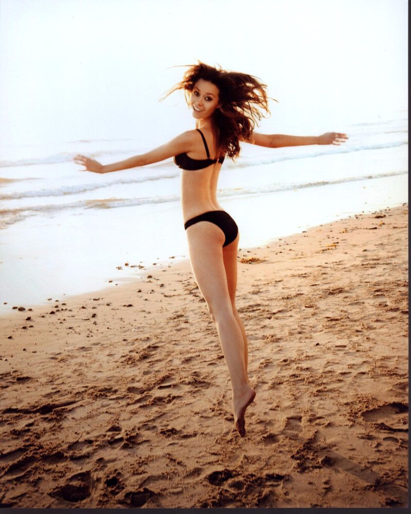 Summer Glau dancing on the beach photo print