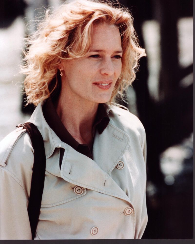 Robin Wright in trench coat photo print, showcasing elegance and style.