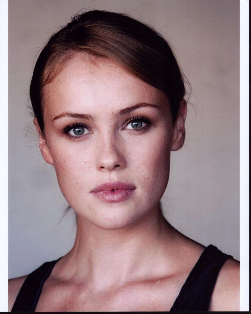 Hannah's stunning headshot in a black tank top photo print.