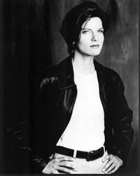 Black and white photo print of Heather Medway in a leather jacket with hands on hips.