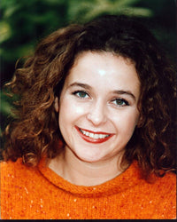 Julia Sawalha headshot photo print in orange sweater.