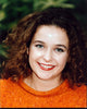 Julia Sawalha headshot photo print in orange sweater.