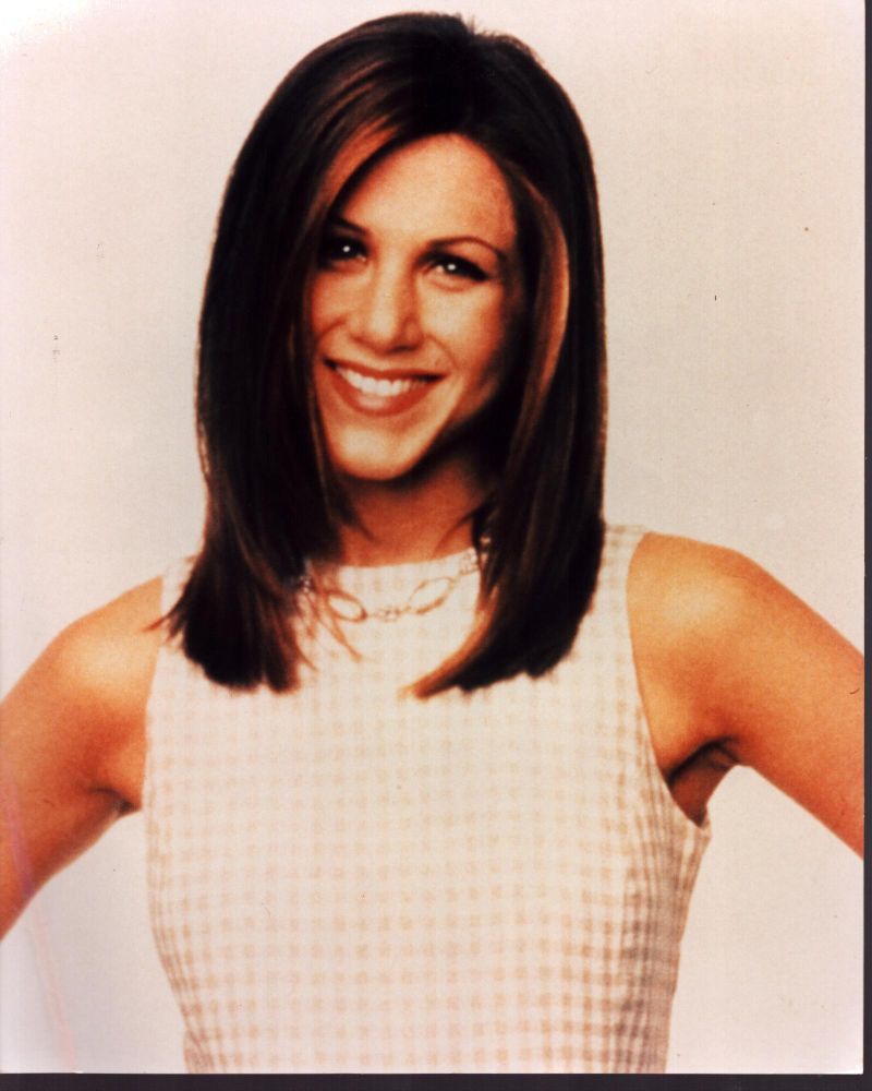 Jennifer Aniston photo print in tan checkered top, perfect for home decor.